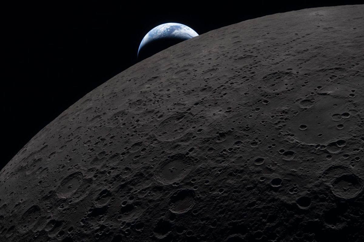 Earthset captured through the Orion spacecraft window at 6:41 p.m. April 6, during the Artemis II crew’s flyby of the Moon. On Earth's dayside shown, clouds are seen swirling over the Australia and Oceania region. Photo courtesy of NASA.