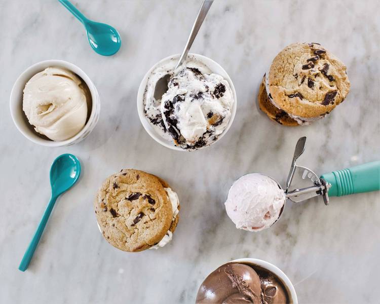 Featured is Gelati Celesti’s famous handmade ice cream. Their most famous flavor, Just Ask, contains white chocolate ice cream between two cookies with Oreos mixed in and a peanut butter lined tub. Photo courtesy of Gelati Celesti.