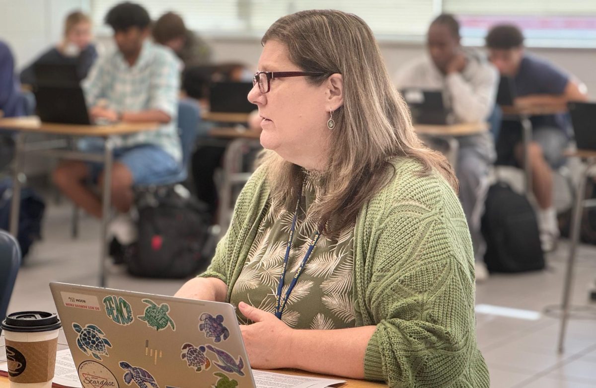 Lisa Gibson conducts an in-depth AP review session on May 5 in her classroom during her first block class. In addition to teaching both core and AP classes, Gibson sponsors many clubs related to international relations and civics, including Model UN, Academic WorldQuest and more.