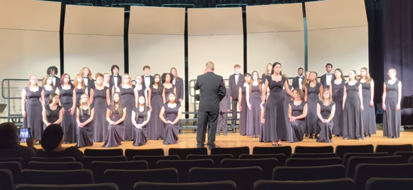Chorus teacher William Boardman leads the Ocean Lakes chorus at Norview High School on Mar. 18, 2026. Photo courtesy of Kenny Derryberry.
