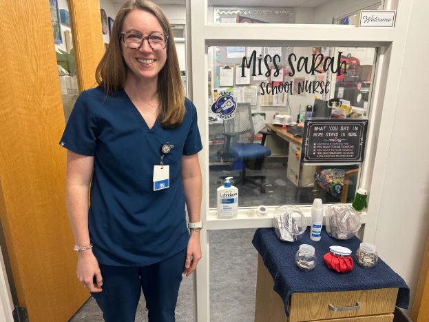 School nurse Sarah Fridley stands outside of her office on May 5 at the Ocean Lakes clinic. Fridley led the “Project ADAM” team of staff members to a cardiac arrest designation over the summer.